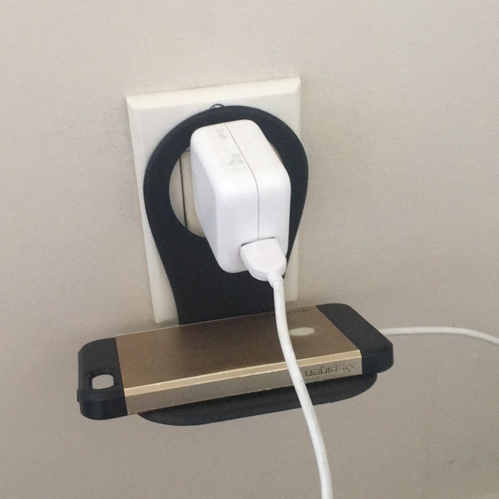 Black phone charging holder